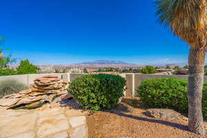 View of yard with a mountain view