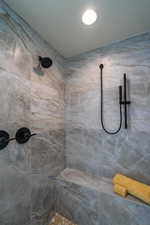 Bathroom with a tile shower