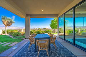 View of patio / terrace with a mountain view