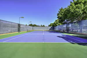 View of sport court with basketball hoop