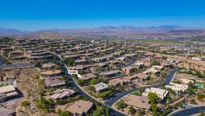 Birds eye view of property with a mountain view