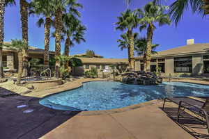 View of swimming pool with a patio