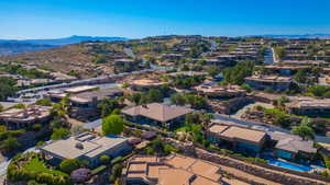 Birds eye view of property with a mountain view