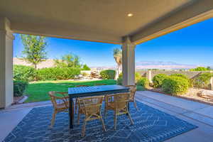 View of patio / terrace with a mountain view