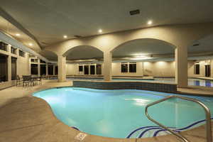 View of pool featuring an indoor hot tub