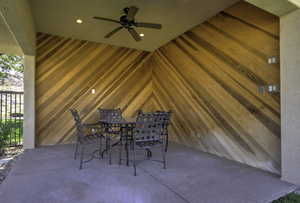 View of patio featuring ceiling fan