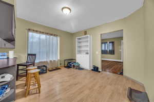 Interior space featuring light wood-type flooring and built in features