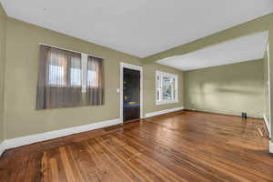 Interior space featuring a healthy amount of sunlight and wood-type flooring