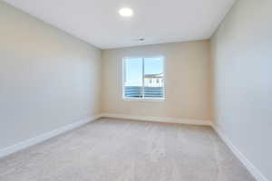 View of carpeted empty room