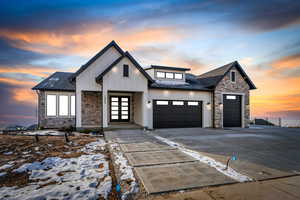 View of front of property with a garage