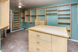 Spacious master closet with lots of storage