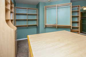 Spacious master closet with lots of storage