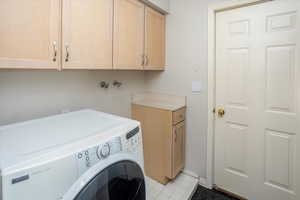 Laundry coming in from garage, gas dryer to remain if needed