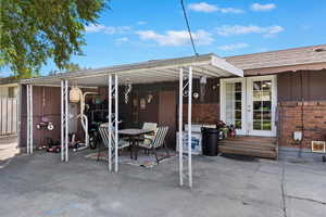 View of patio featuring french doors