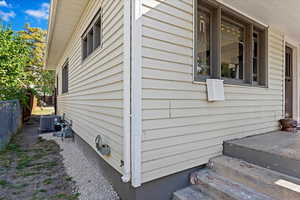 View of property exterior featuring central air condition unit