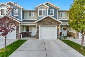 View of front of property with a garage