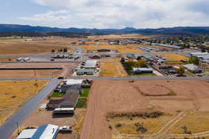 Birds eye view of property with a mountain view