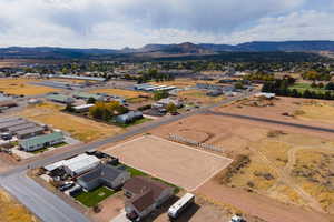 Birds eye view of property featuring a mountain view