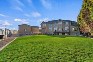 View of yard with a wooden deck