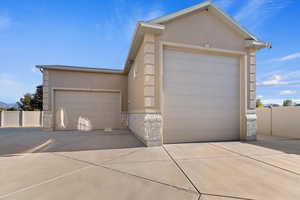 View of front facade featuring a garage