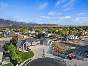 Birds eye view of property with a mountain view