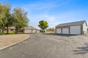 Detached garage with plenty of parking.