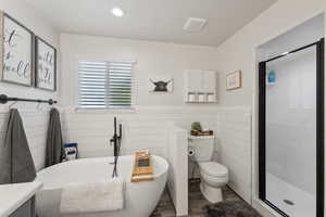 Full Master bathroom with separate shower and tub