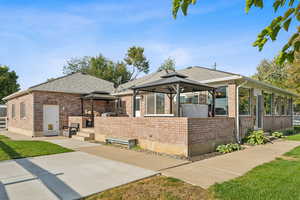 Exterior space featuring a gazebo and a patio area