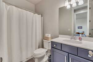 Bathroom with quartz counter tops.