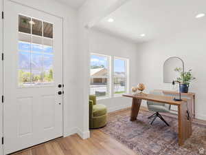 Office/Living room featuring hardwood / wood-style floors and a mountain view