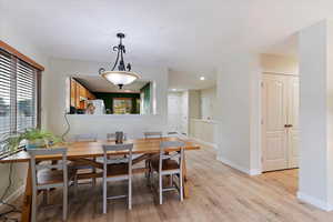 Dining room with light wood-type flooring