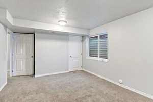 Interior space featuring a textured ceiling