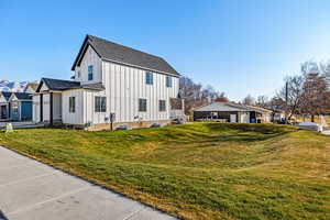 View of home's exterior featuring a lawn