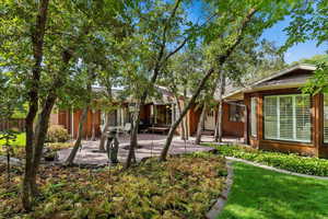 View of yard with a patio