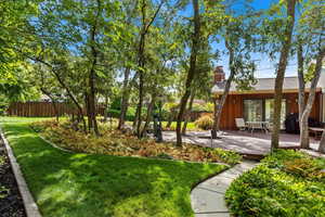 View of yard with a deck