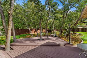 Wooden deck with a yard