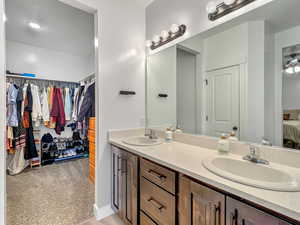 Bathroom with hardwood / wood-style floors and vanity