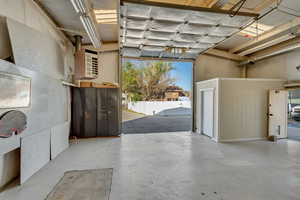 FRONT OF GARAGE IS STORAGE AND A MECHANICS SHOP W/STORAGE