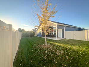 View of yard with a patio area