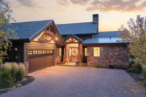 View of front of property with a garage