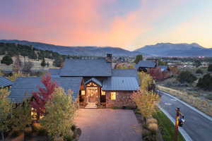 View of front of home featuring a mountain view