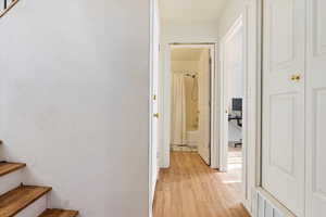 Corridor featuring light hardwood / wood-style floors