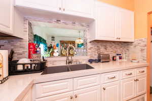 Quartz Countertops & Window Through to Dining Area