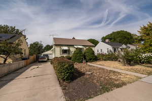 Long Driveway Leading to 2 Car Garage