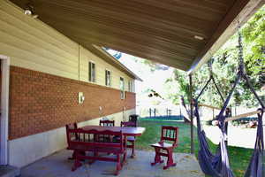 View of patio / terrace with central AC unit