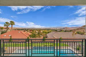 View of gate featuring a mountain view