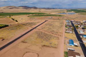 Drone / aerial view featuring a mountain view