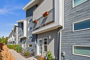 View of property featuring central AC unit