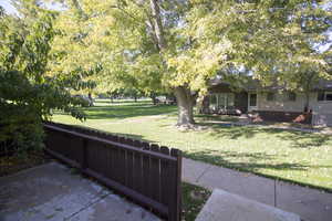 Looking from front door into open area