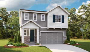 Craftsman-style house featuring a garage and a front lawn